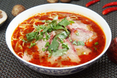 ţ